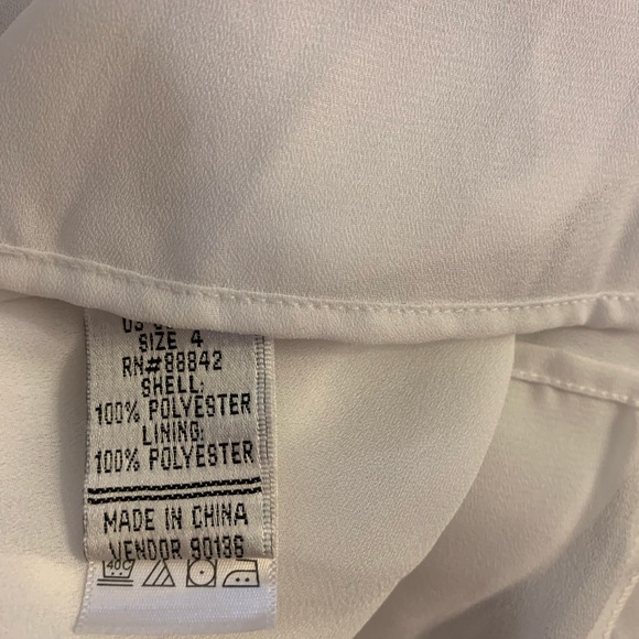 Abstract summer sleeveless dress. Size 4 with zipper on the side.Watch video - Picture 4 of 6